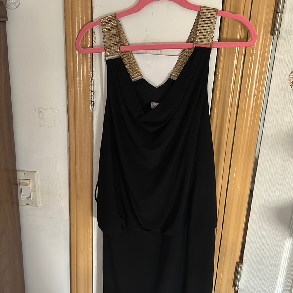 Scandalous black tight dress for a fancy night out